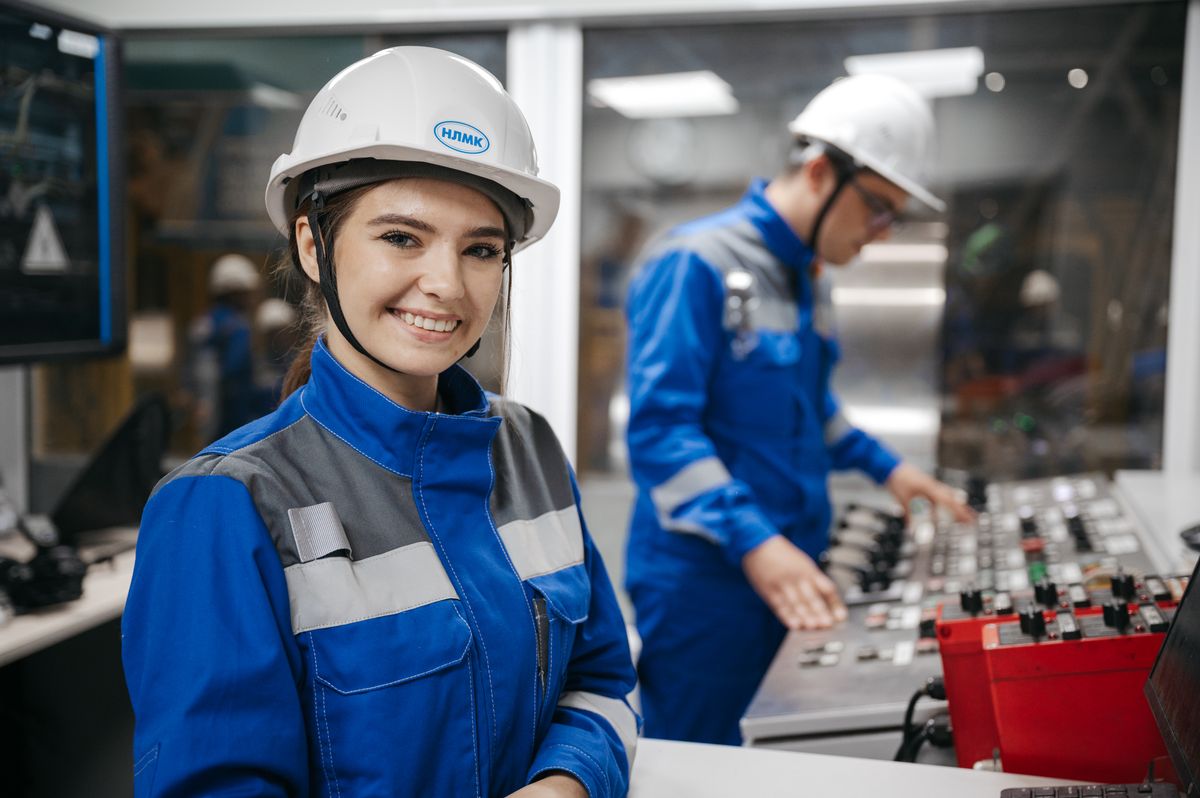 Two grid engineers reviewing a protection scheme together