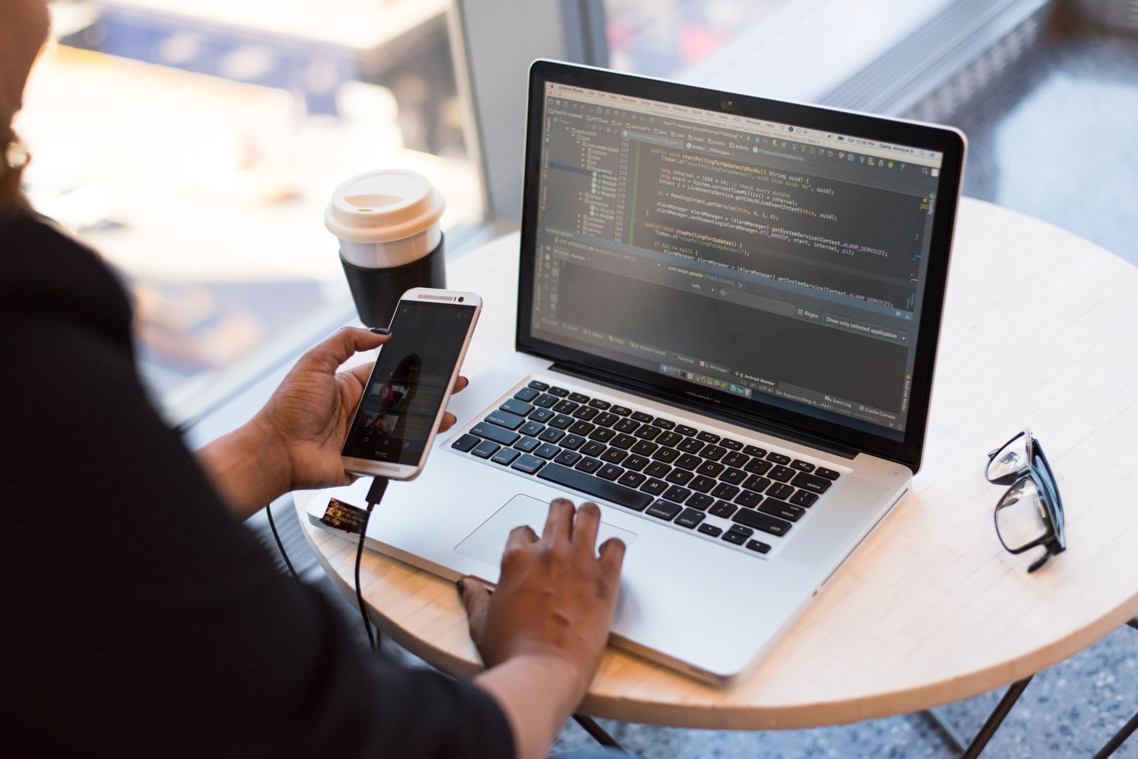 An engineer building software on a laptop